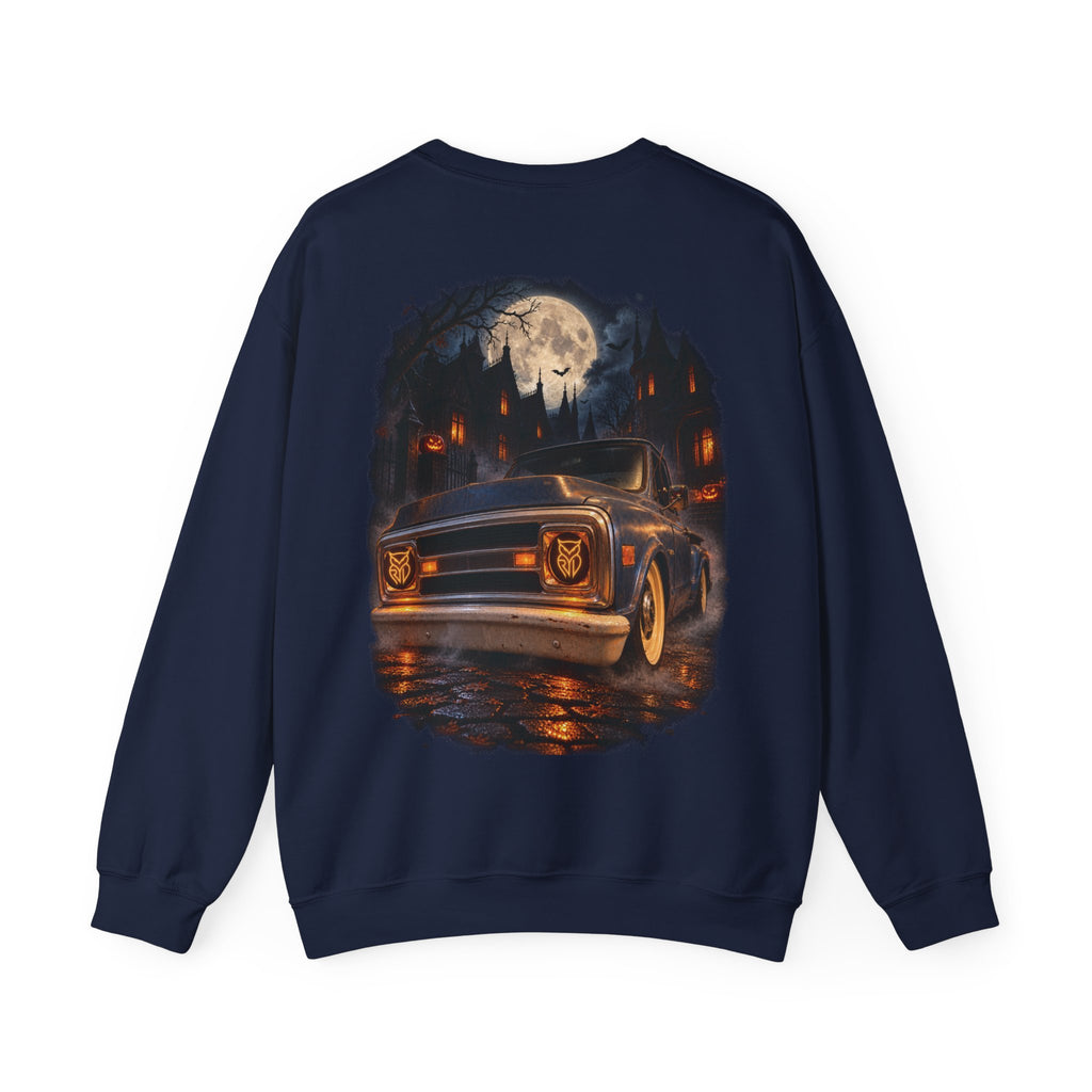 Rare Lab After Dark crewneck sweatshirt: small glowing Rare Lab owl jack-o'-lantern on the chest, C10 truck with owl jack-o'-lantern headlights on the back