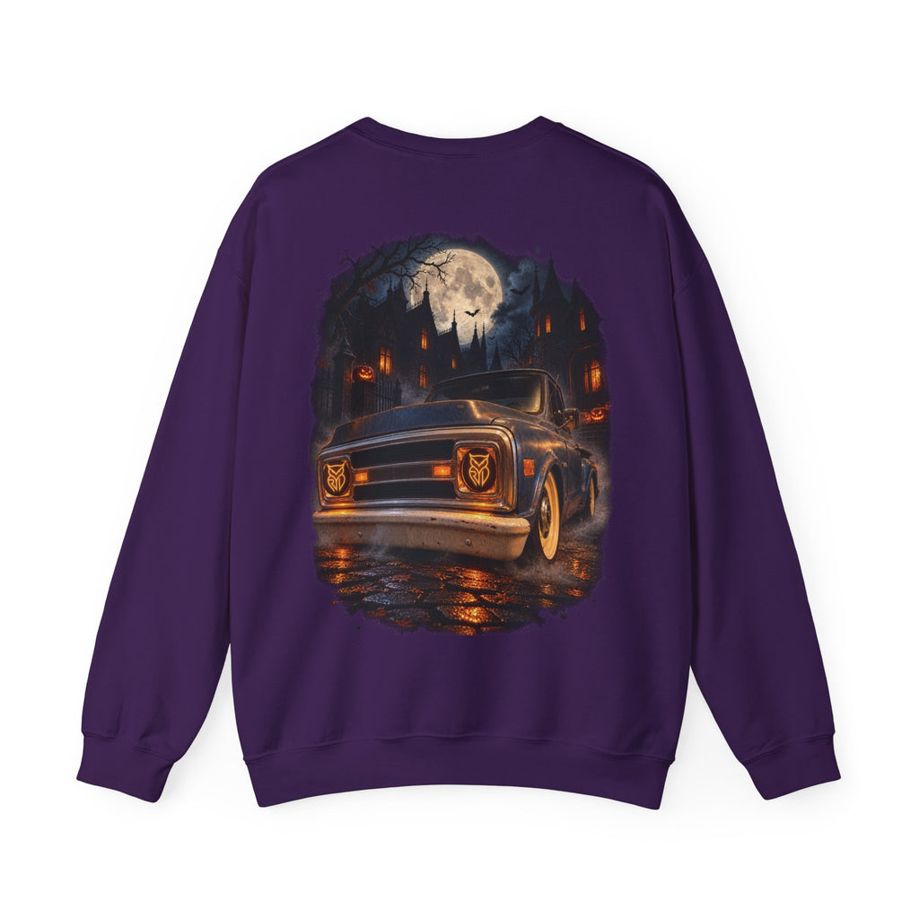Rare Lab After Dark crewneck sweatshirt: small glowing Rare Lab owl jack-o'-lantern on the chest, C10 truck with owl jack-o'-lantern headlights on the back
