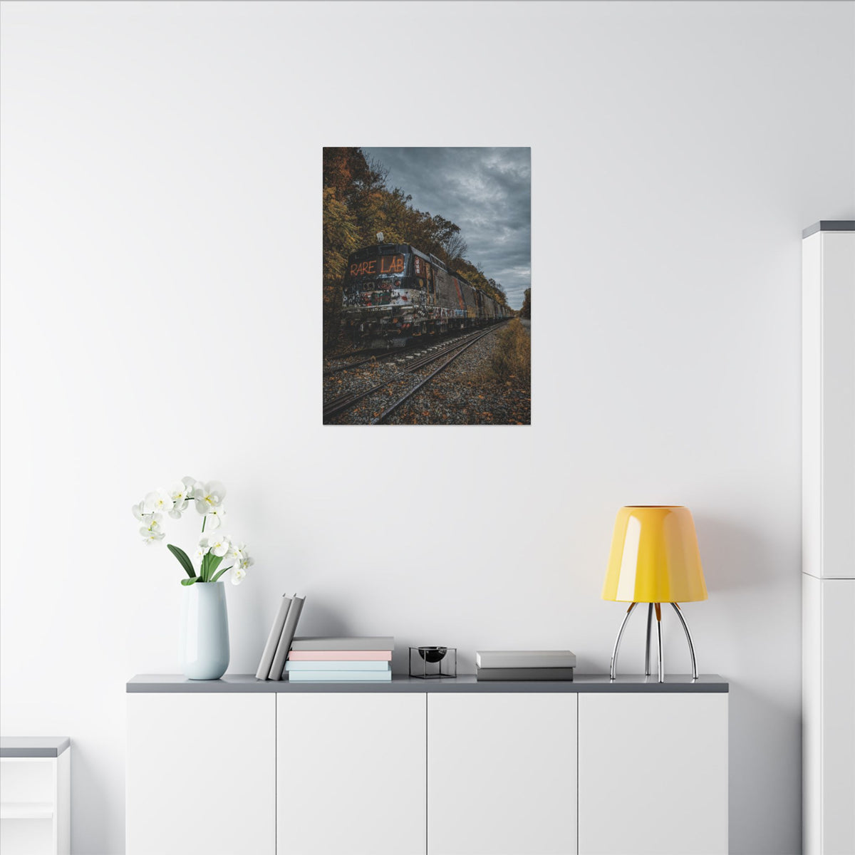 Rare Lab Graffiti Train canvas: a graffiti-covered train under a brooding sky with golden autumn trees