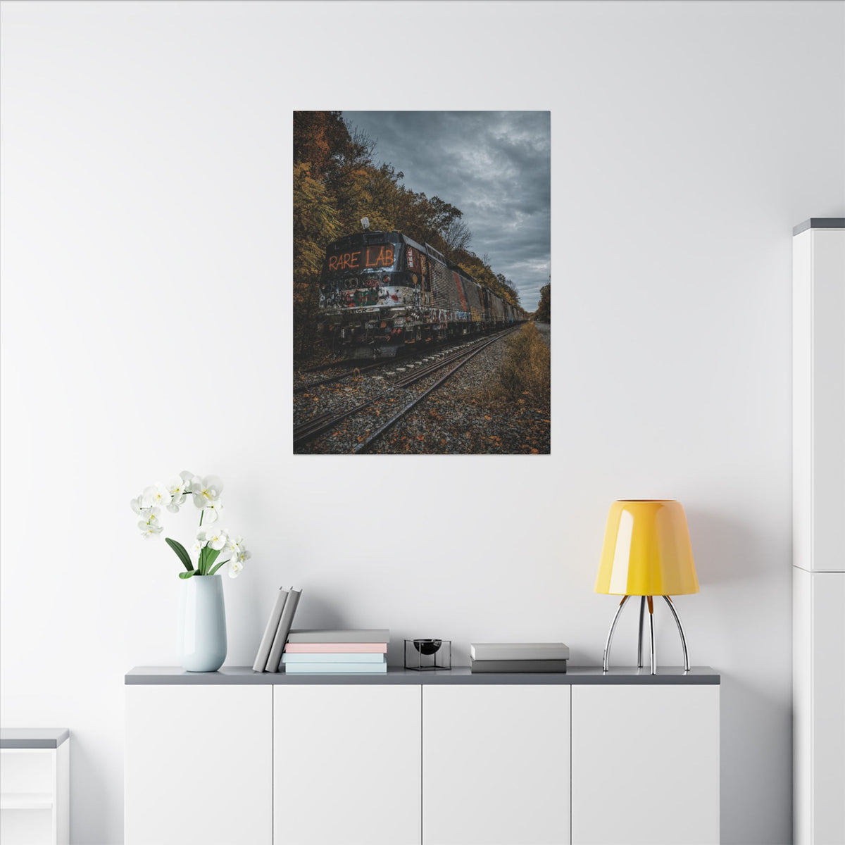 Rare Lab Graffiti Train canvas: a graffiti-covered train under a brooding sky with golden autumn trees