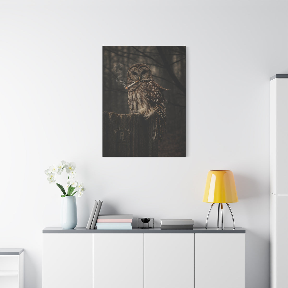 Rare Lab Smoke & Stillness matte canvas: a barred owl on a weathered post with a thin trail of smoke against the dark
