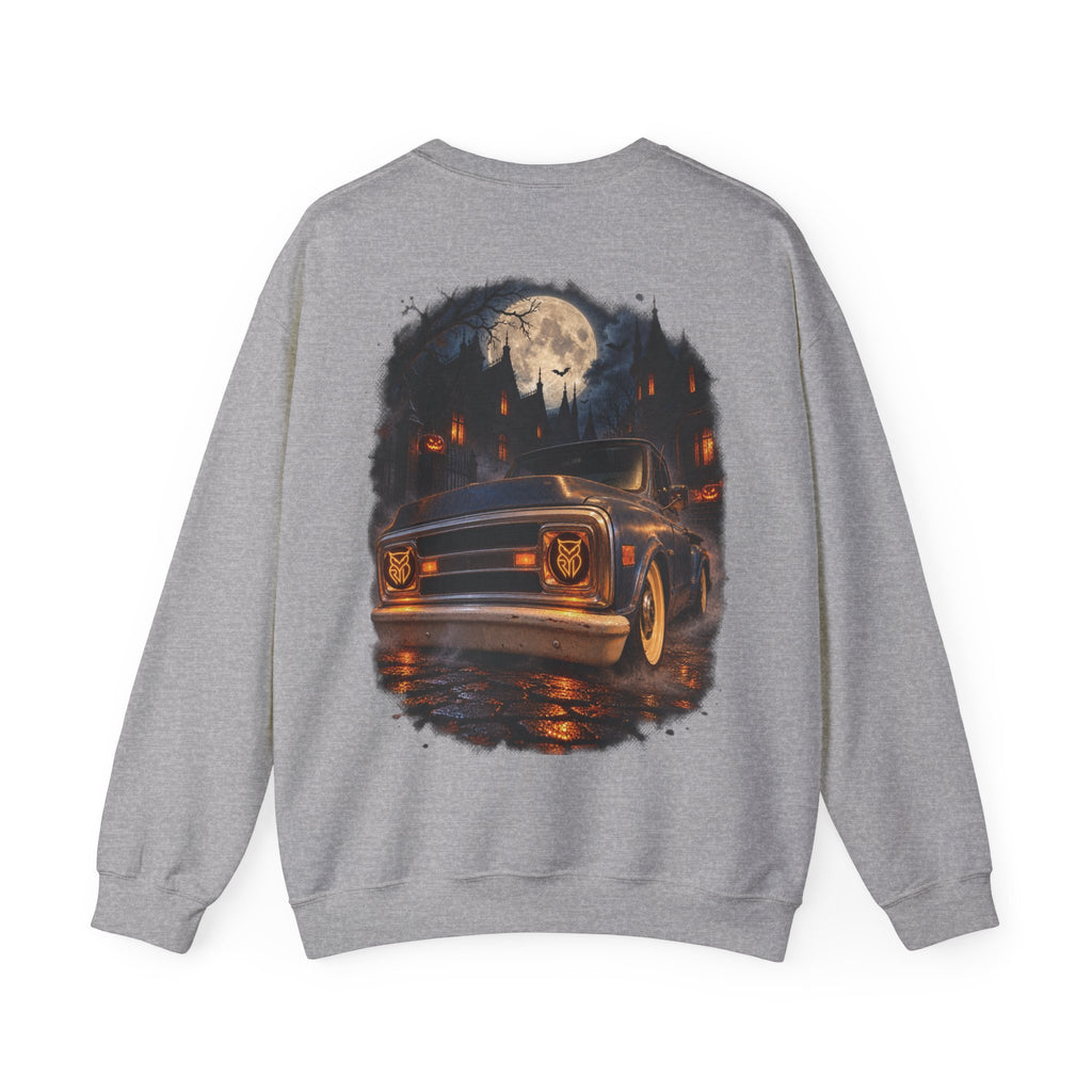 Rare Lab After Dark crewneck sweatshirt: small glowing Rare Lab owl jack-o'-lantern on the chest, C10 truck with owl jack-o'-lantern headlights on the back
