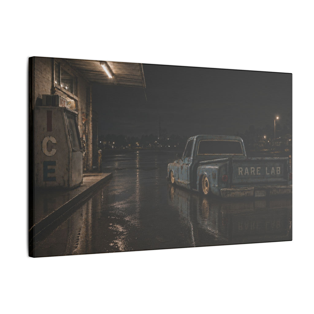 Rare Lab Ice Box canvas: a weathered blue pickup at a rain-slicked, late-night gas stop