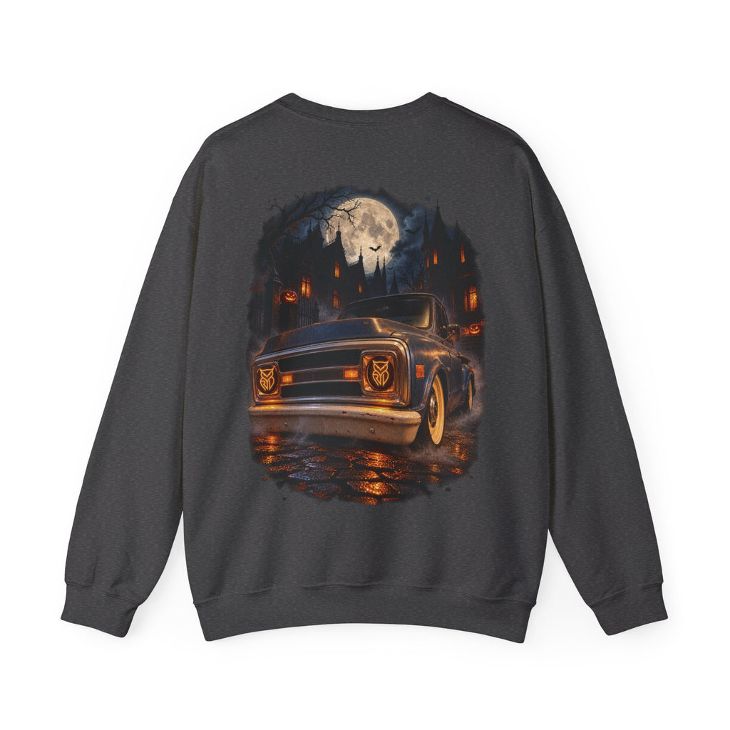 Rare Lab After Dark crewneck sweatshirt: small glowing Rare Lab owl jack-o'-lantern on the chest, C10 truck with owl jack-o'-lantern headlights on the back