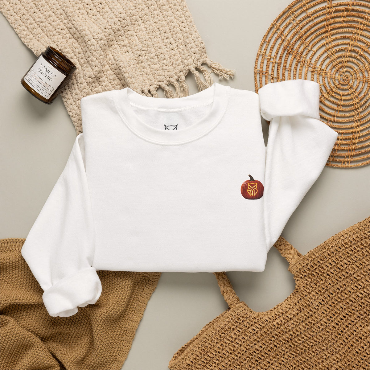 Rare Lab After Dark crewneck sweatshirt: small glowing Rare Lab owl jack-o'-lantern on the chest, C10 truck with owl jack-o'-lantern headlights on the back