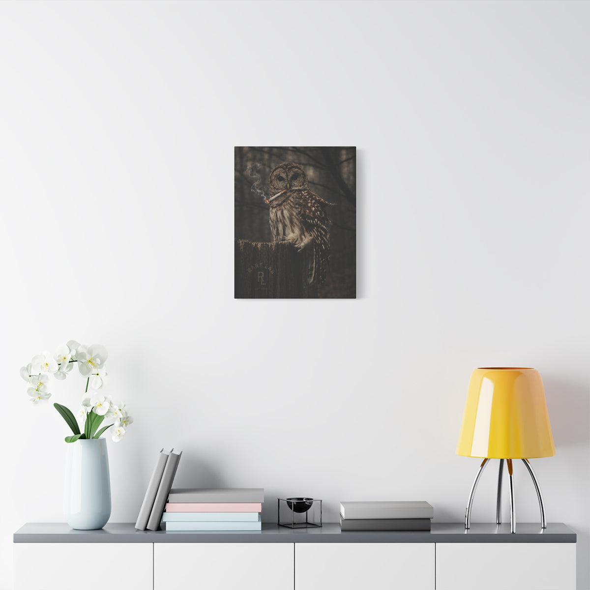 Rare Lab Smoke & Stillness matte canvas: a barred owl on a weathered post with a thin trail of smoke against the dark