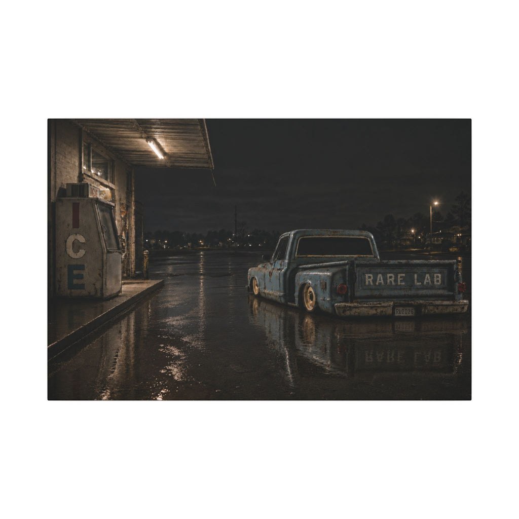 Rare Lab Ice Box canvas: a weathered blue pickup at a rain-slicked, late-night gas stop