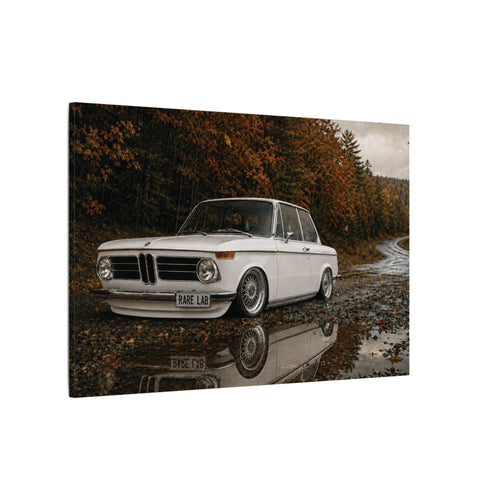 Rare Lab Autumn Ripper canvas: a vintage rally coupe parked by a puddle under autumn trees