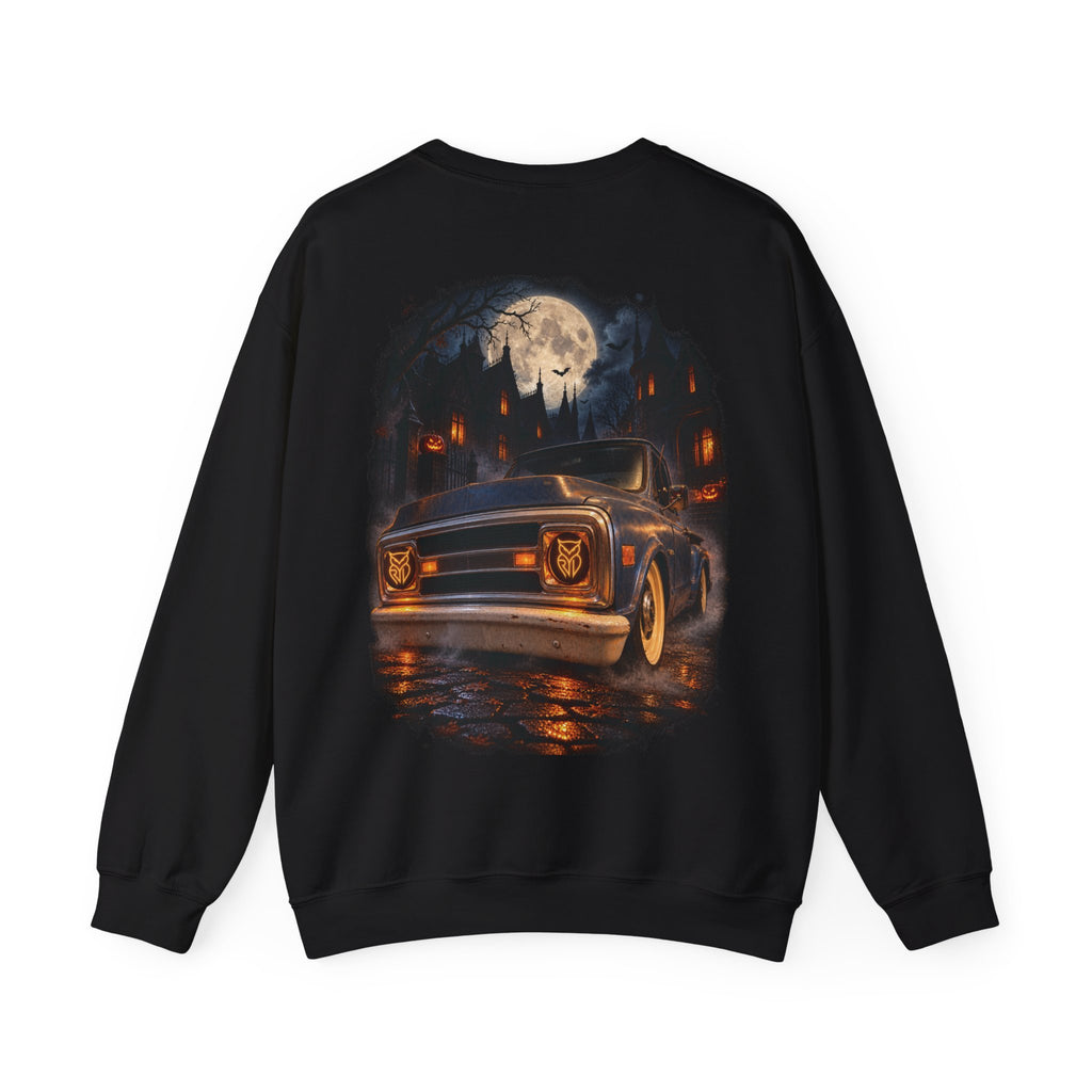 Rare Lab After Dark crewneck sweatshirt: small glowing Rare Lab owl jack-o'-lantern on the chest, C10 truck with owl jack-o'-lantern headlights on the back