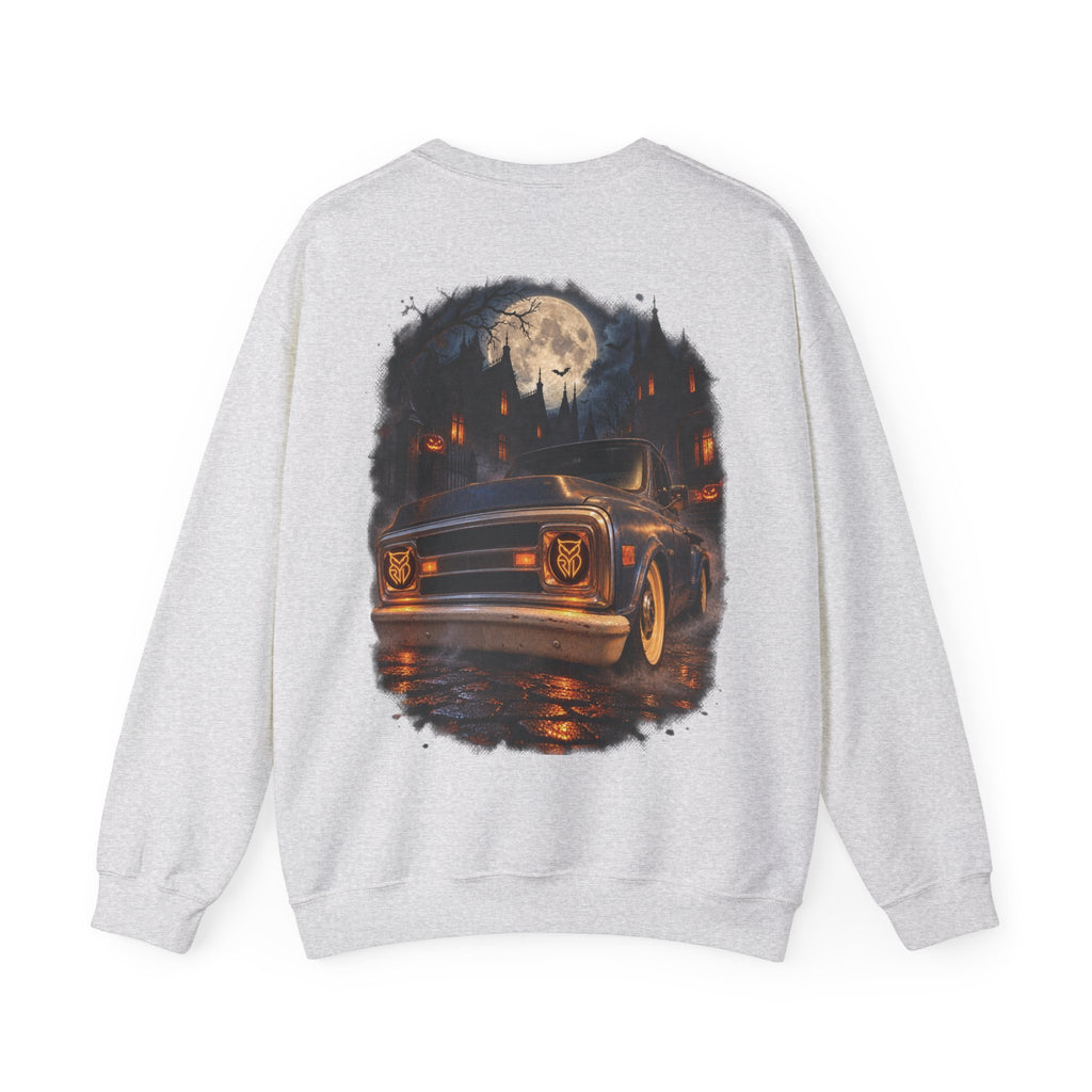 Rare Lab After Dark crewneck sweatshirt: small glowing Rare Lab owl jack-o'-lantern on the chest, C10 truck with owl jack-o'-lantern headlights on the back