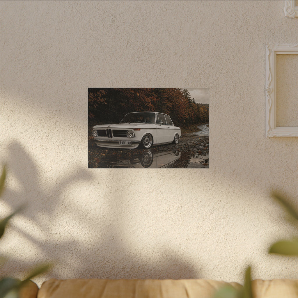 Rare Lab Autumn Ripper canvas: a vintage rally coupe parked by a puddle under autumn trees